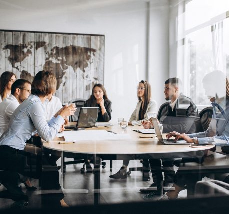Group of people working out business plan in an office