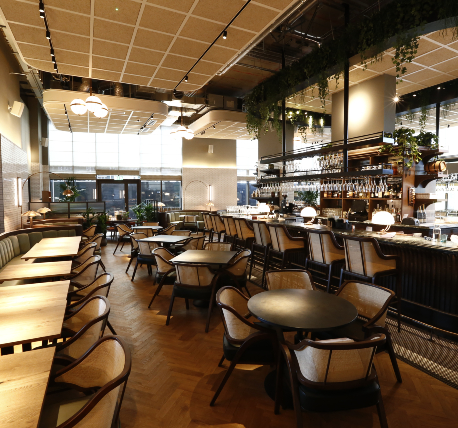 Restaurant with bespoke bar and ceiling rafts