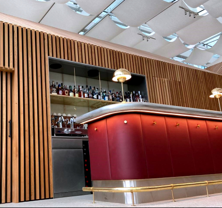 Lounge bar with walls decorated with timber cladding