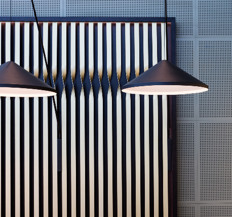 Bespoke steal clad wall to rear of reception area and pendant lights